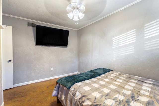 carpeted bedroom featuring ceiling fan and crown molding