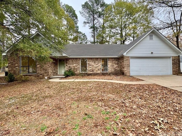 ranch-style house featuring a garage