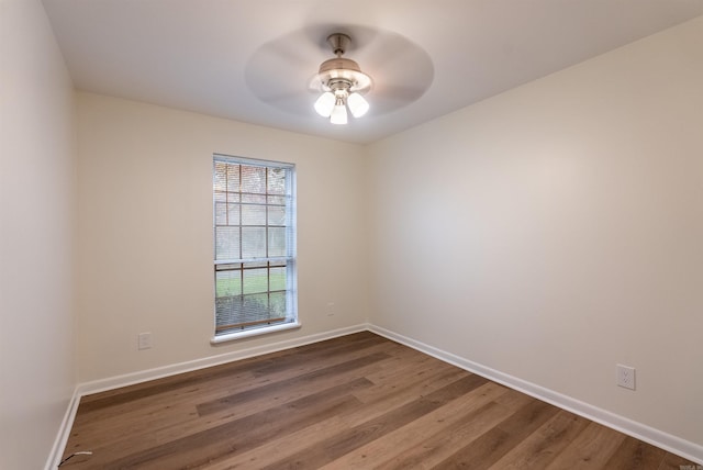 unfurnished room featuring ceiling fan and hardwood / wood-style floors