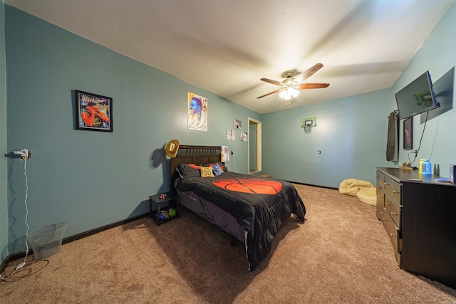 bedroom featuring light colored carpet and ceiling fan