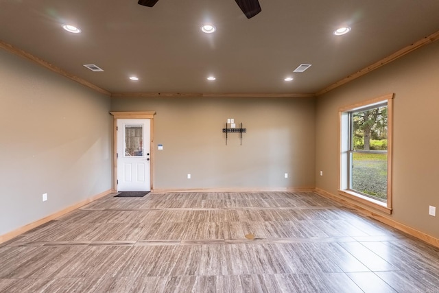 unfurnished room with ornamental molding