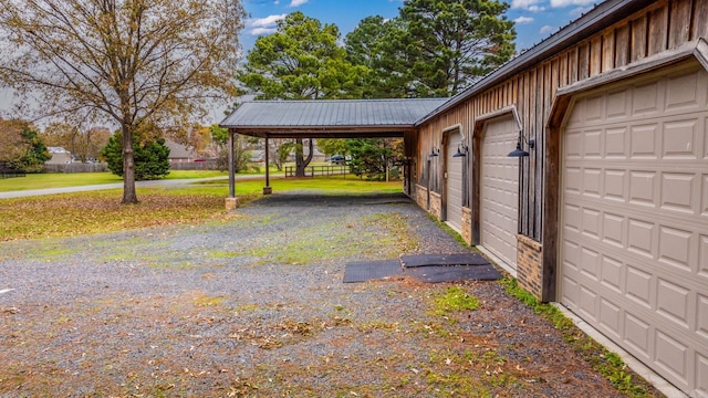 exterior space with a carport