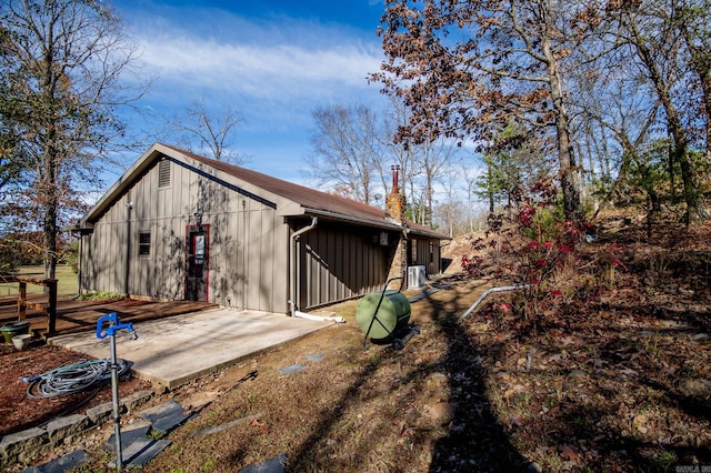 view of outdoor structure featuring central AC unit