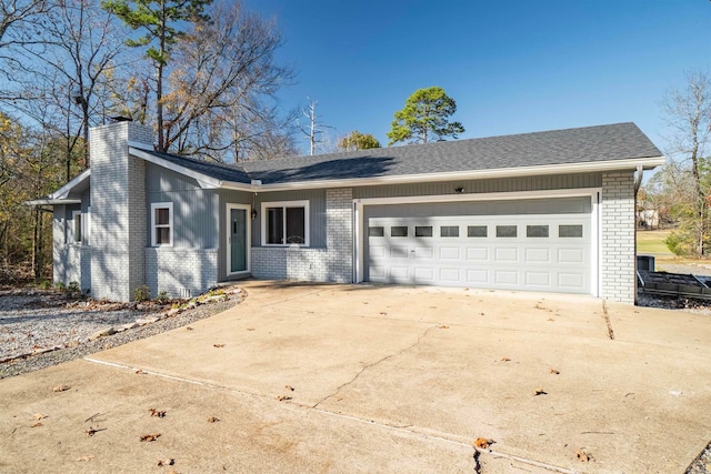 single story home with a garage