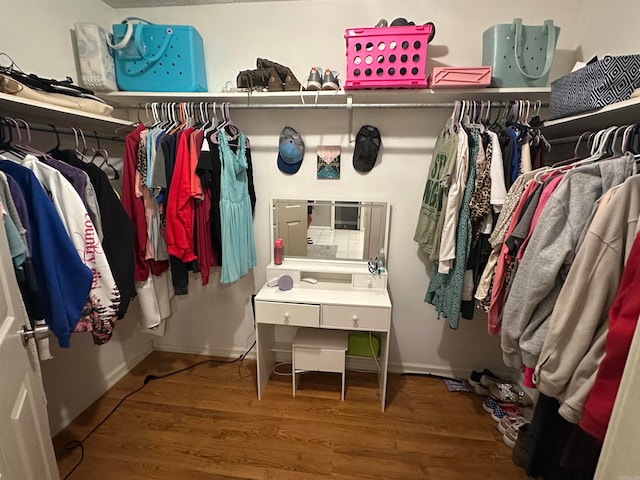 spacious closet with wood-type flooring