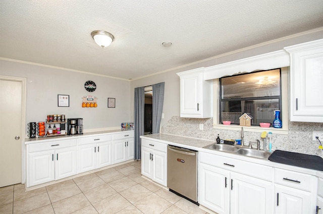 kitchen with white cabinets, sink, stainless steel dishwasher, decorative backsplash, and ornamental molding