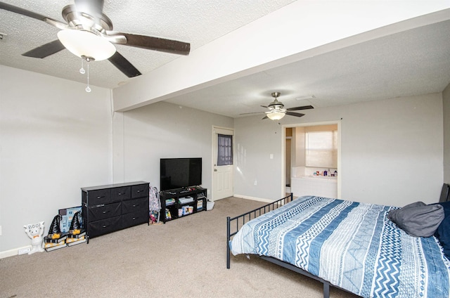 carpeted bedroom featuring a textured ceiling and ceiling fan