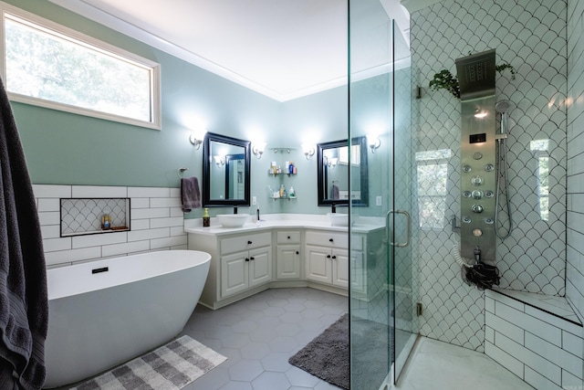 bathroom featuring vanity, tile patterned floors, tile walls, and independent shower and bath