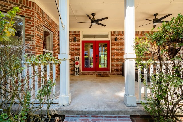 property entrance with ceiling fan, french doors, and covered porch