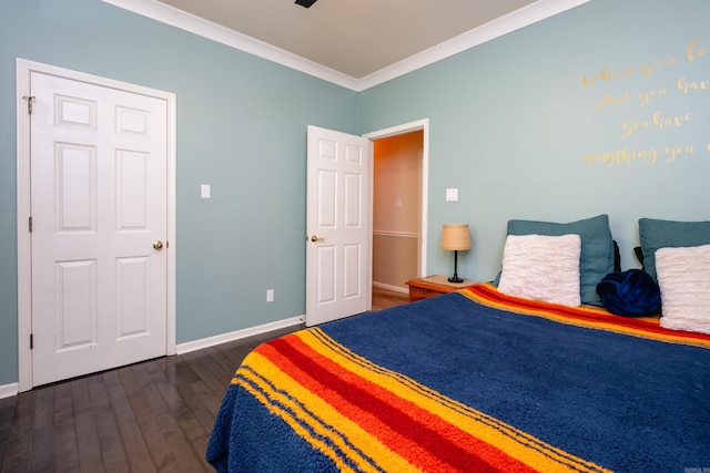 bedroom with crown molding and dark wood-type flooring