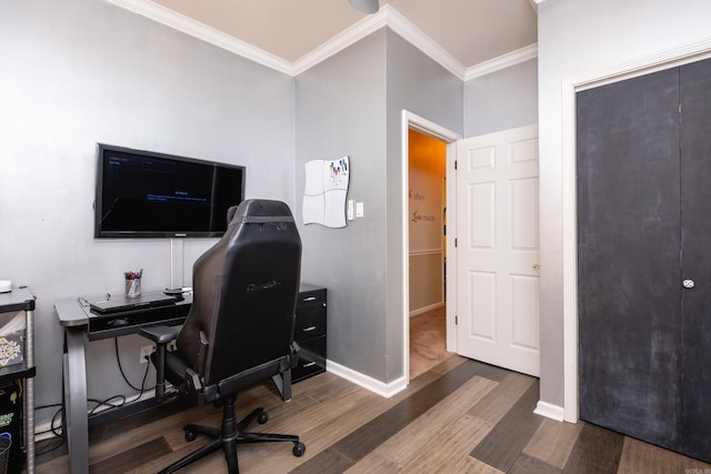 office space featuring dark hardwood / wood-style floors and crown molding