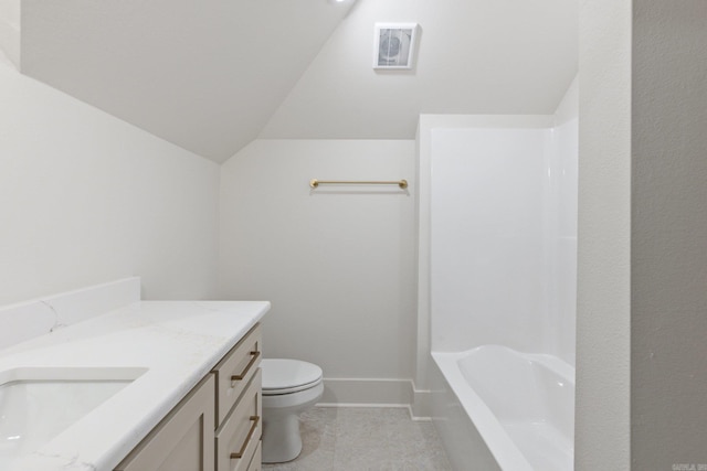 bathroom featuring tile patterned floors, vanity, toilet, and vaulted ceiling