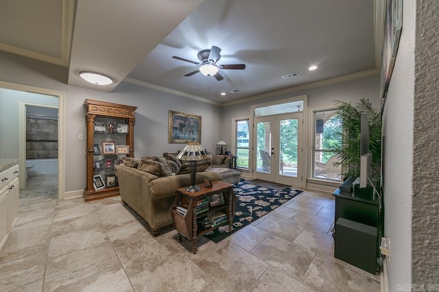 living room with ceiling fan, french doors, and crown molding