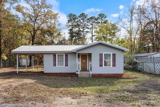 view of front of house with a carport