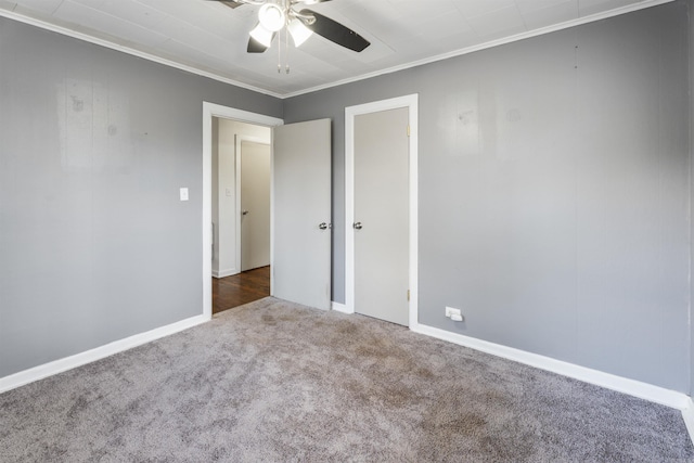 unfurnished bedroom with carpet, ceiling fan, and ornamental molding