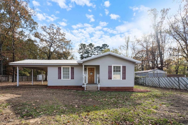 view of front of house featuring a carport