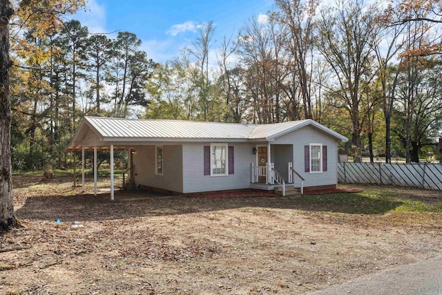 view of front of house with a carport