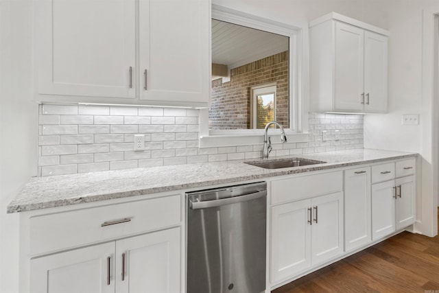 kitchen with dishwasher, white cabinets, dark wood-type flooring, and sink