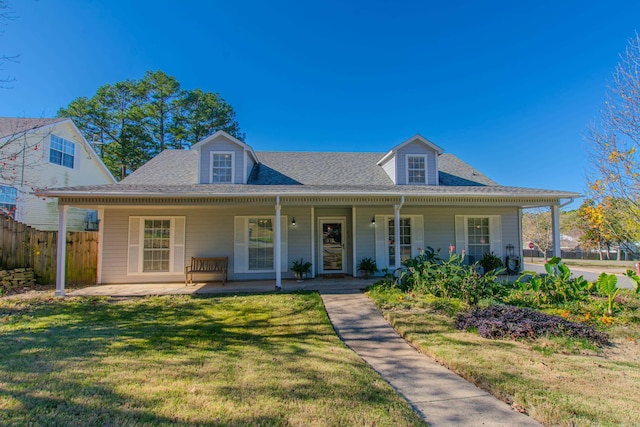 view of front of home featuring a front lawn and covered porch