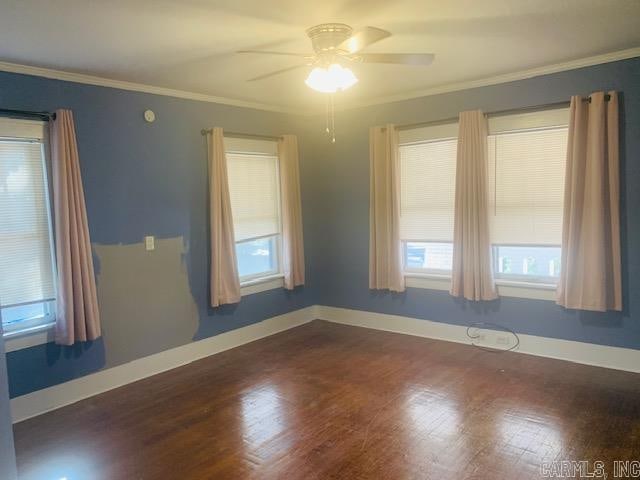 unfurnished room featuring crown molding, ceiling fan, and wood-type flooring