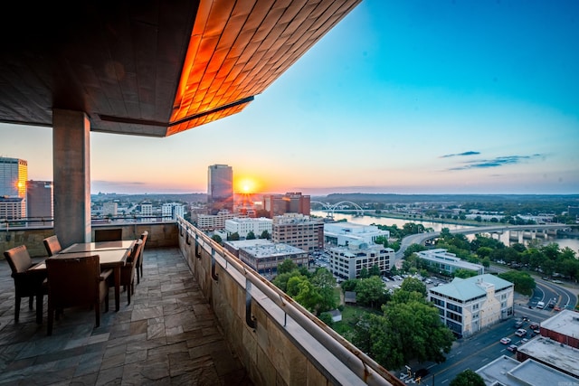 view of balcony at dusk