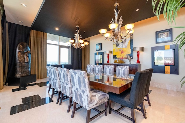 dining area with light tile patterned floors and a chandelier