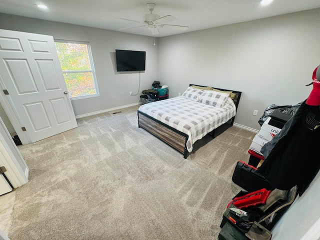 carpeted bedroom with ceiling fan