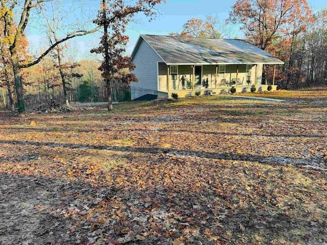 exterior space featuring covered porch