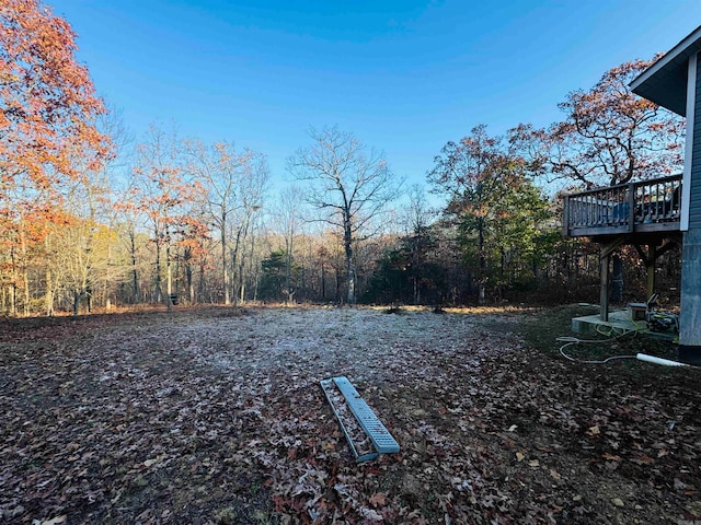 view of yard with a deck