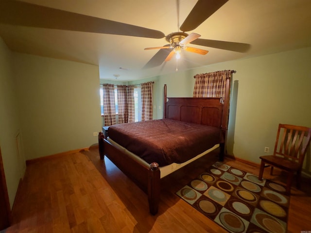 bedroom featuring ceiling fan and light hardwood / wood-style flooring