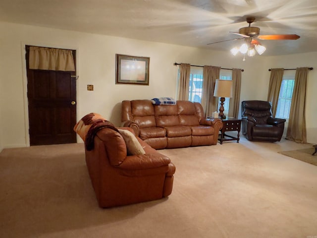 living room with carpet, plenty of natural light, and ceiling fan