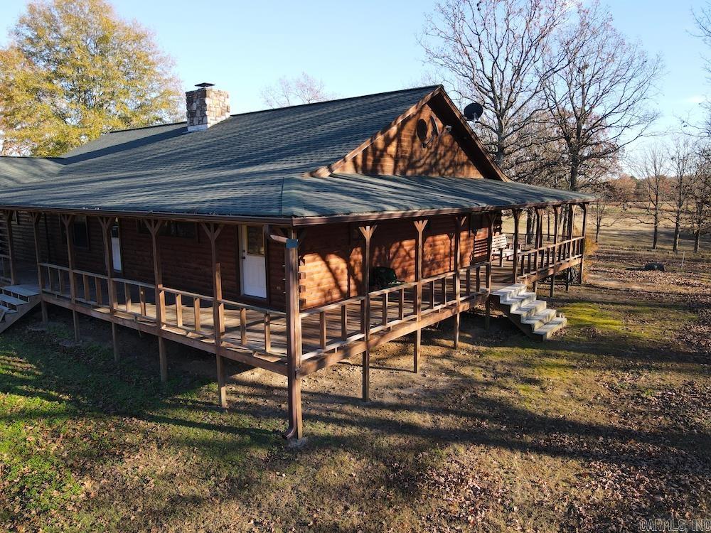 view of side of property with a porch