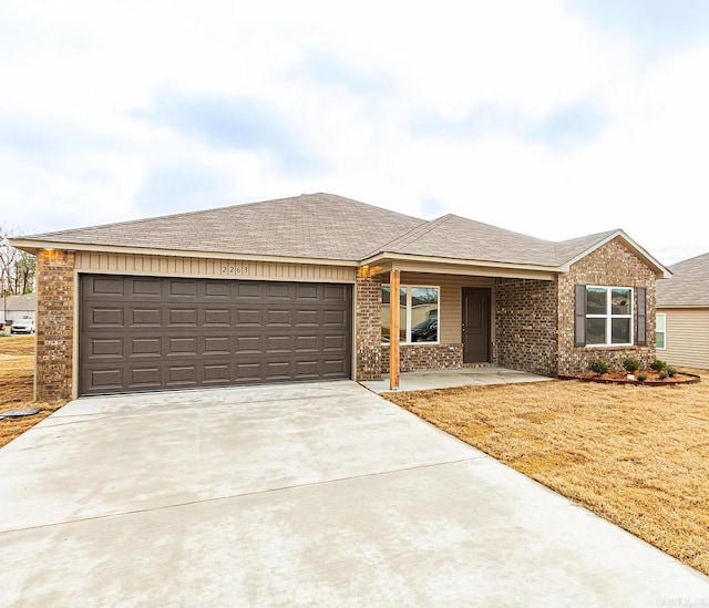 ranch-style home with a garage