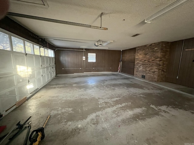 garage with wood walls