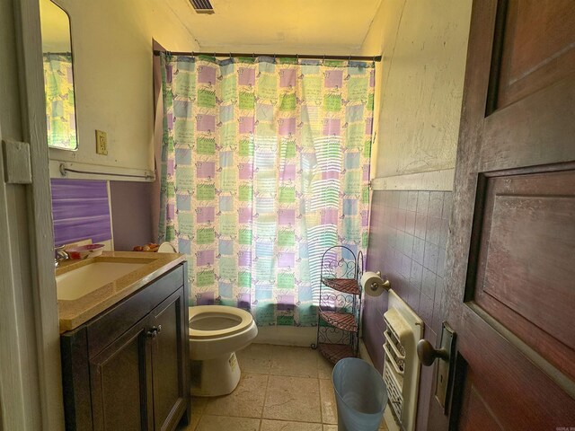 2600 S Battery, Little Rock, AR 72206 - bathroom featuring toilet, vanity, and shower / bath combo with shower curtain
