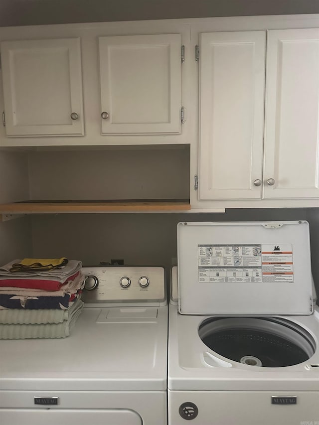 laundry area with independent washer and dryer