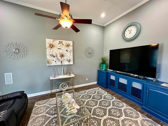 living room with dark hardwood / wood-style flooring and crown molding