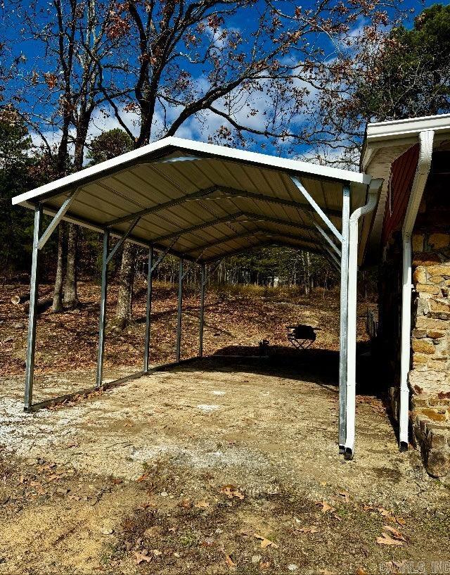 view of parking with a carport