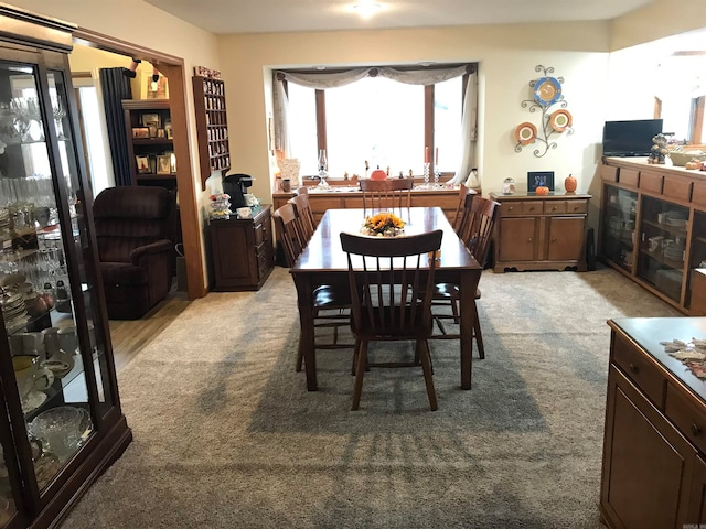 view of carpeted dining room