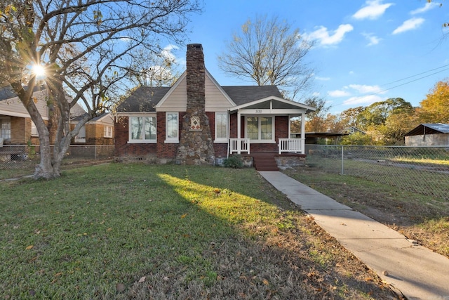 bungalow featuring a porch and a front yard