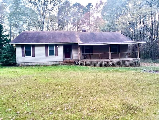 single story home featuring a front yard