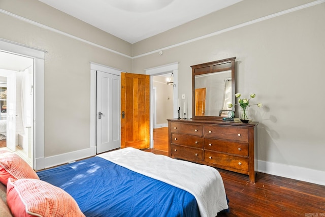 bedroom featuring dark hardwood / wood-style floors