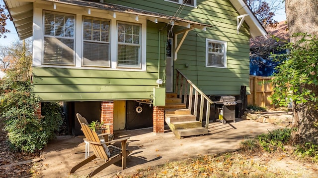 rear view of property featuring a patio