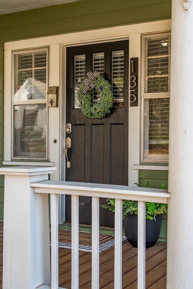 doorway to property with a porch