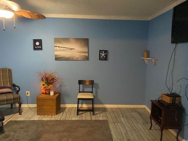 sitting room featuring light hardwood / wood-style floors