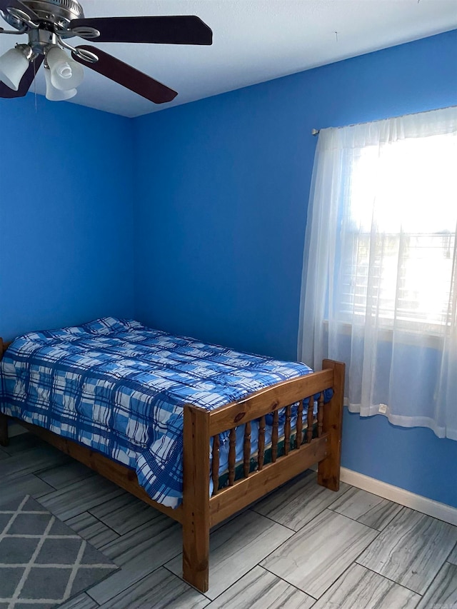 bedroom featuring ceiling fan