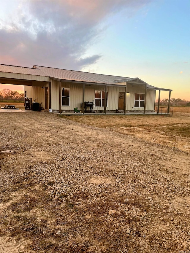 view of front of house featuring a carport