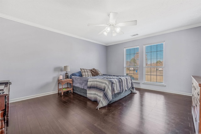 bedroom featuring ceiling fan, dark hardwood / wood-style floors, and ornamental molding