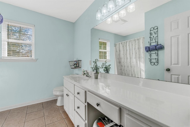 bathroom with tile patterned flooring, vanity, a shower with shower curtain, and toilet