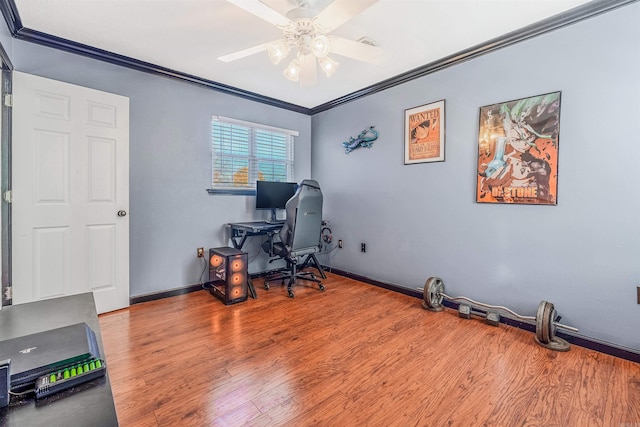 office with hardwood / wood-style floors, ceiling fan, and crown molding